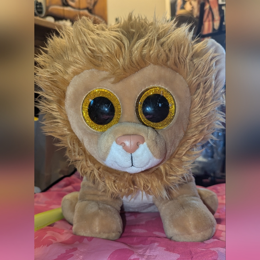 18 inch Louie the Lion Ty Beanie Boo.He is in good condition.